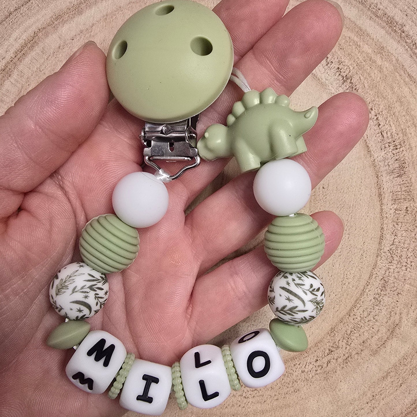 Attache-tétine personnalisée Modèle Milo dino nature