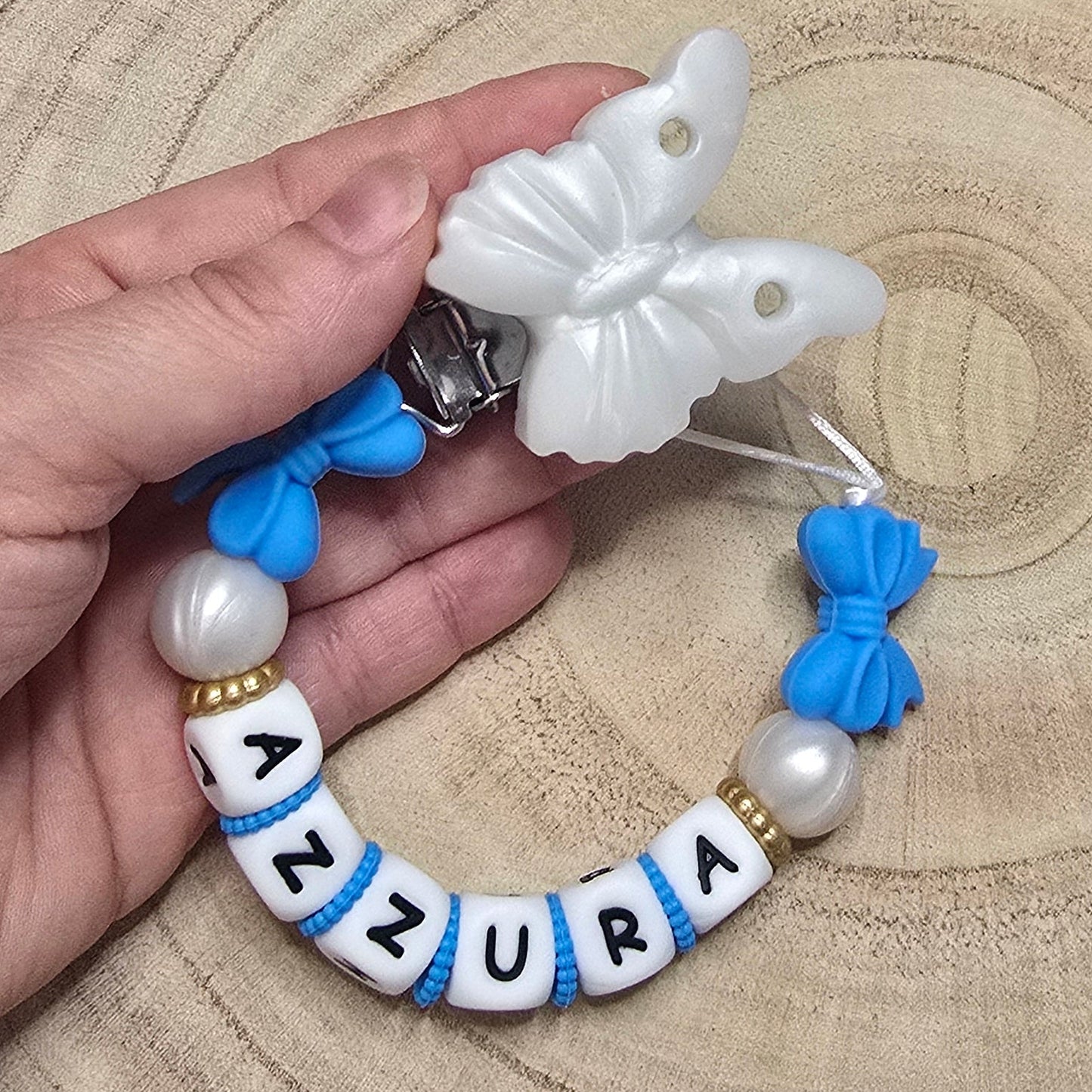 Attache-tétine personnalisée Modèle Azzura Papillon nacré