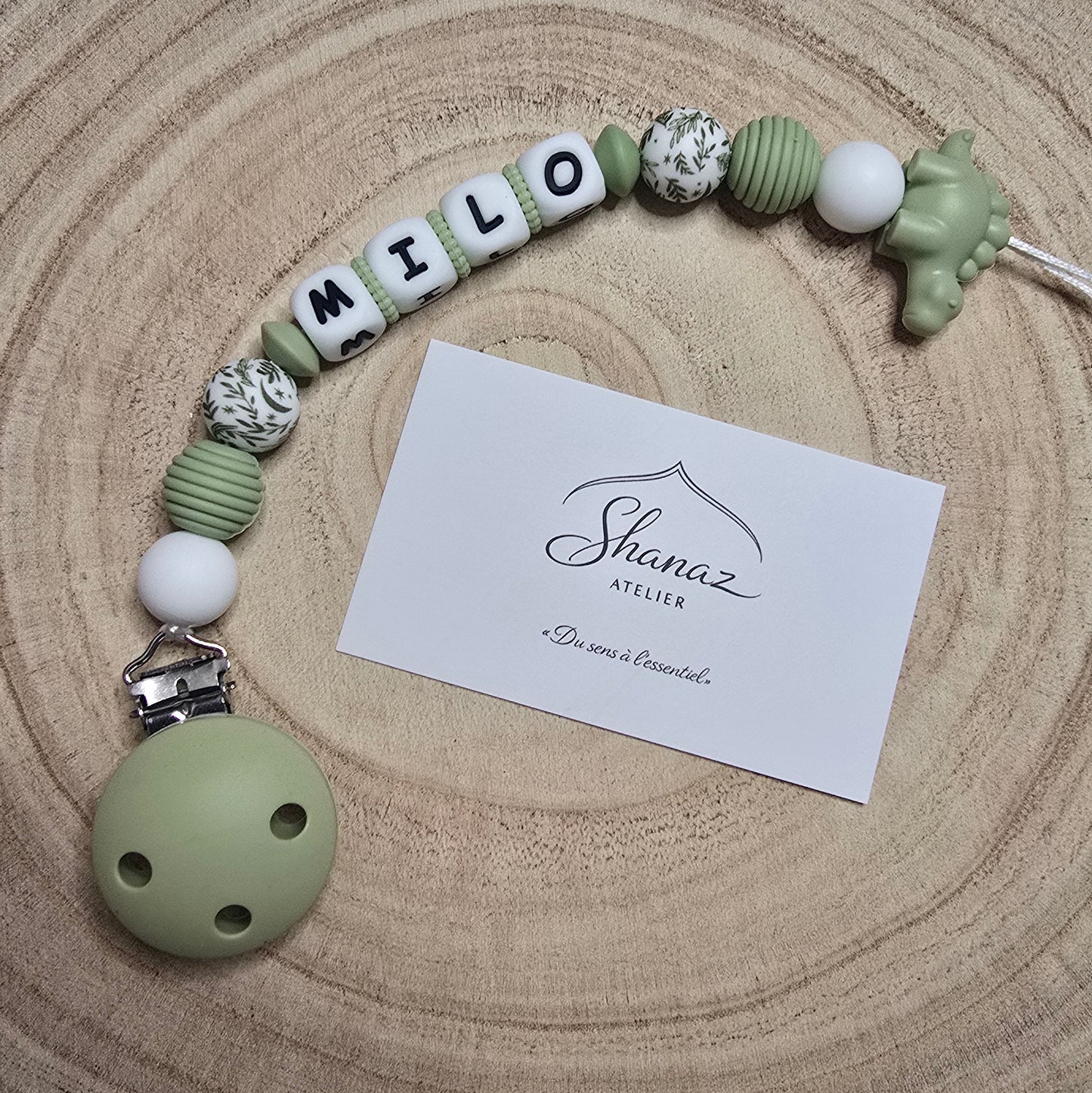 Attache-tétine personnalisée Modèle Milo dino nature