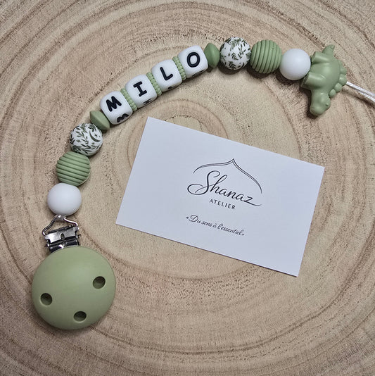 Attache-tétine personnalisée Modèle Milo dino nature