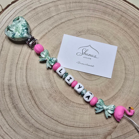 Attache-tétine personnalisée Modèle Liya Flamant rose feuillage tropical