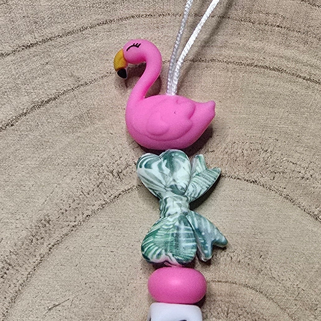 Attache-tétine personnalisée Modèle Liya Flamant rose feuillage tropical