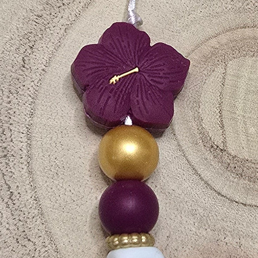 Attache-tétine personnalisée Modèle Loucia Hibiscus prune